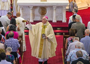 Long journey ends in joyous ordination ceremony in front of packed audience IMAGE